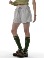 DryKit – Schnelltrocknende doppellagige Sportshorts für Damen